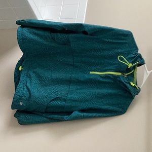 Blue and neon green raincoats